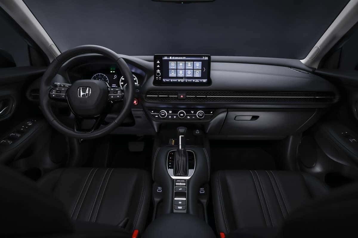 Giá xe Honda HR-V cũ cập nhật 6 Interior view of a Honda HR-V showcasing its modern dashboard, infotainment system, and functional cabin design.