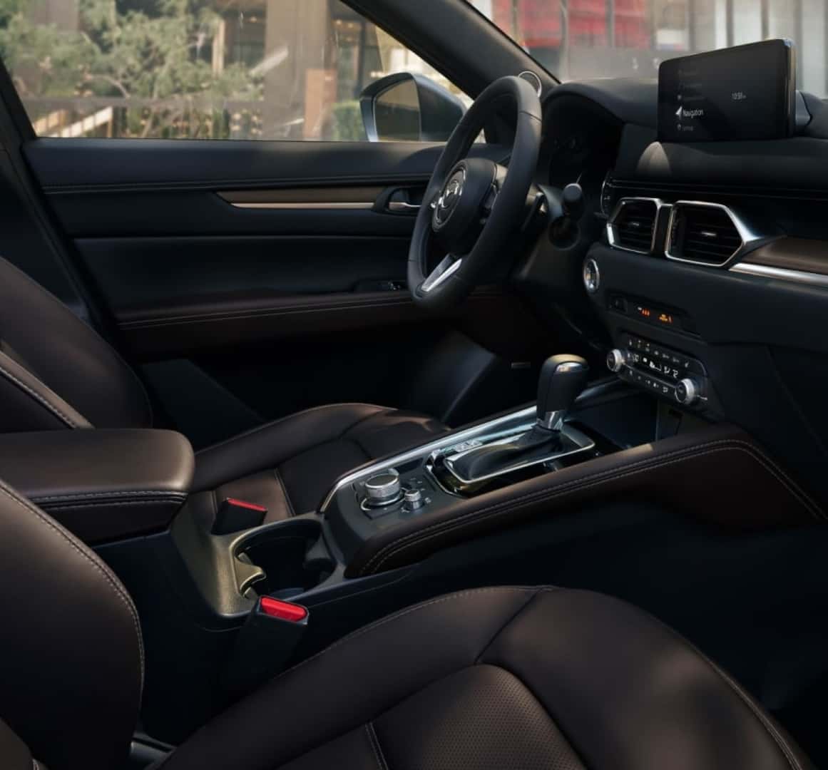 So sánh các phiên bản Mazda CX-5 tại Việt Nam: Đánh giá chi tiết và hướng dẫn mua xe 8 Interior view of the 2025 Mazda CX-5 showcasing premium leather seats, modern dashboard, and center console design.