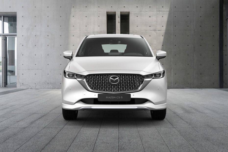Sự khác biệt giữa Mazda CX5 Deluxe và Mazda CX5 Luxury 2025: Phân tích chi tiết, kinh nghiệm chọn phiên bản tối ưu 3 Front view of the 2025 Mazda CX-5 showcasing its modern grille and sleek headlights.